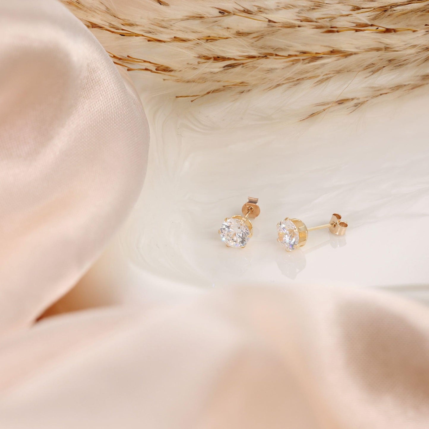 9ct Yellow Gold 5mm Claw Set Cubic Zirconia Studs